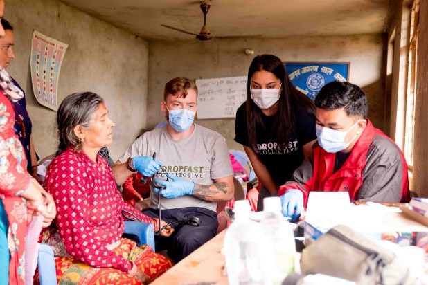 Medical volunteers wearing face masks and gloves